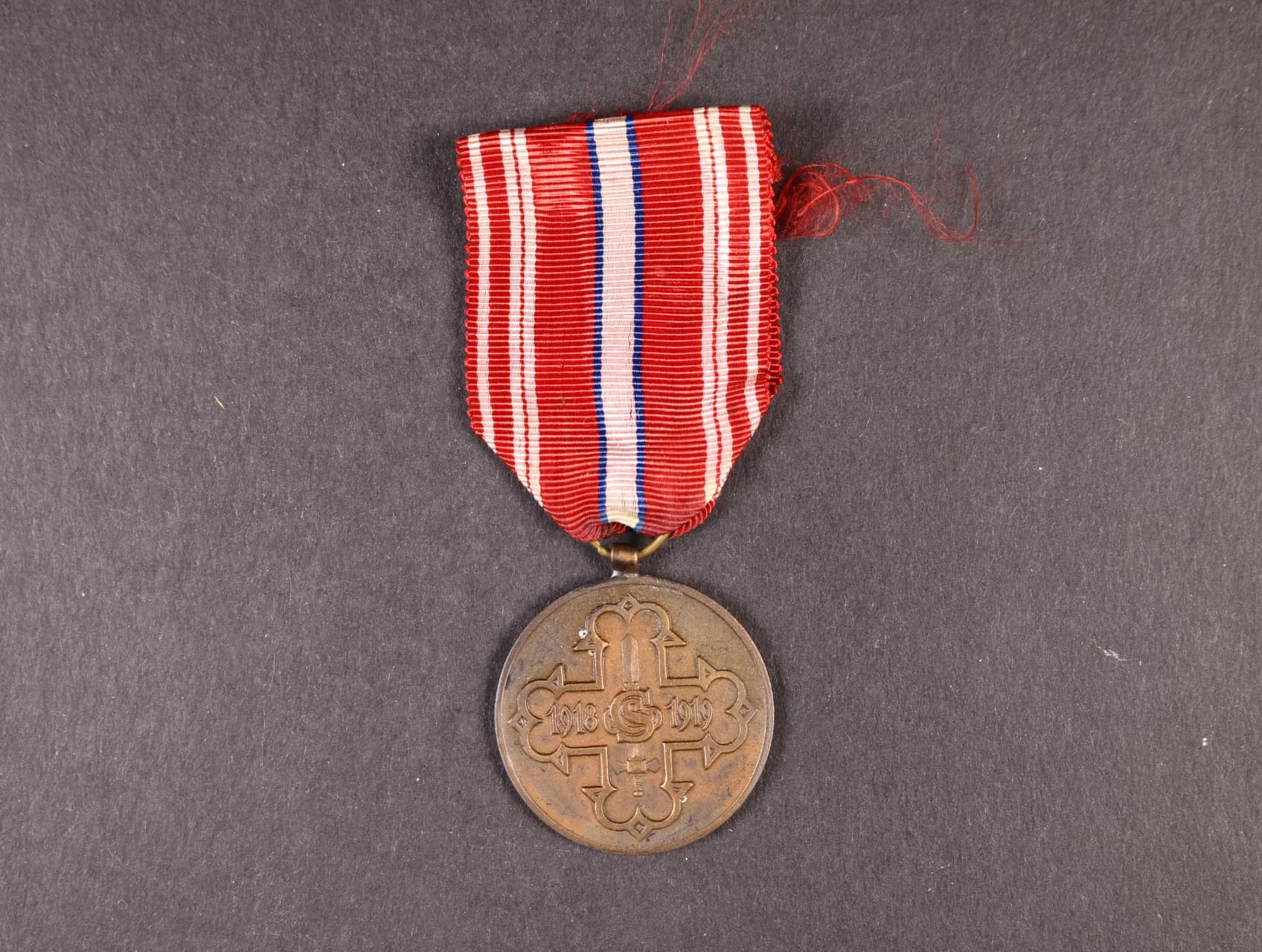 Pamětní odznak pro čs. dobrovolníky z let 1918-1919 s monogramem OP