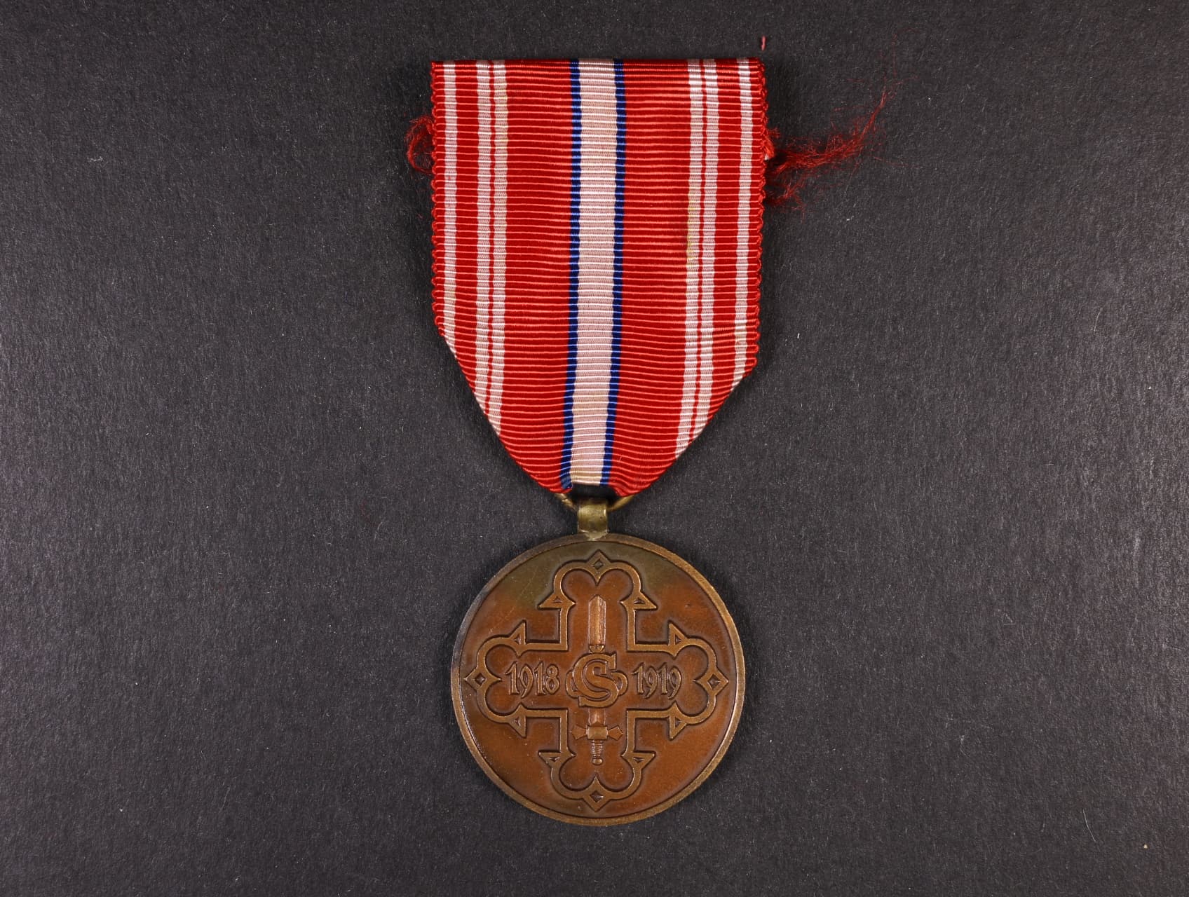 Pamětní odznak pro čs. dobrovolníky z let 1918-1919 s monogramem OP