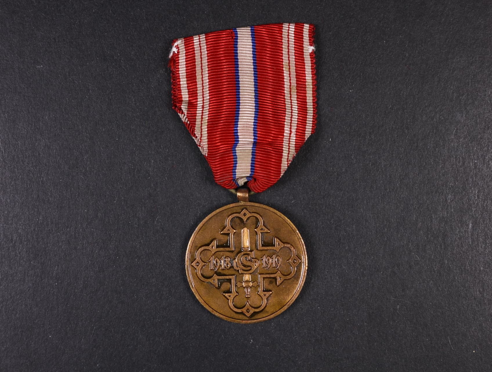 Pamětní odznak pro čs. dobrovolníky z let 1918-1919 s monogramem OP