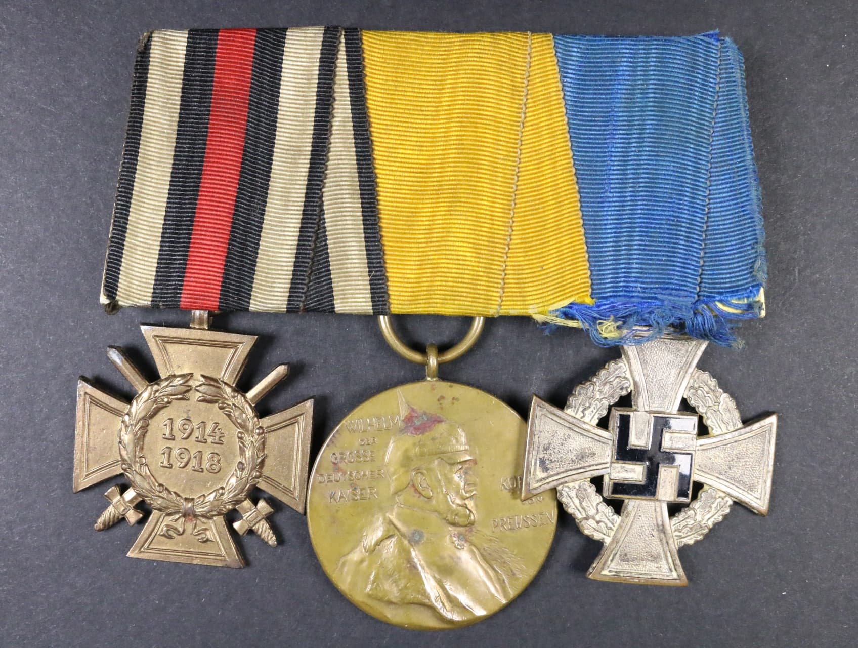 Spojka vyznamenání, Čestný kříž 1914-1918 pro frontové bojovníky, medaile ke stému výročí narození císaře Viléma I. 1897 a stříbrný služební kříž za 25 let služby