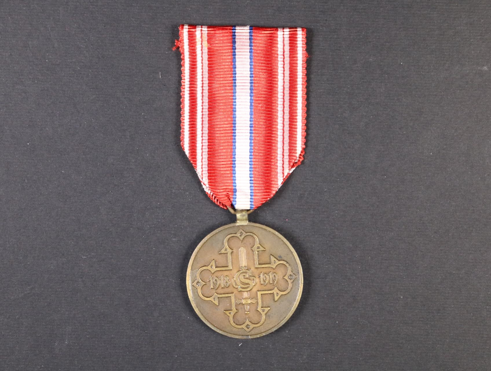 Pamětní odznak pro čs. dobrovolníky z let 1918-1919 s monogramem OP