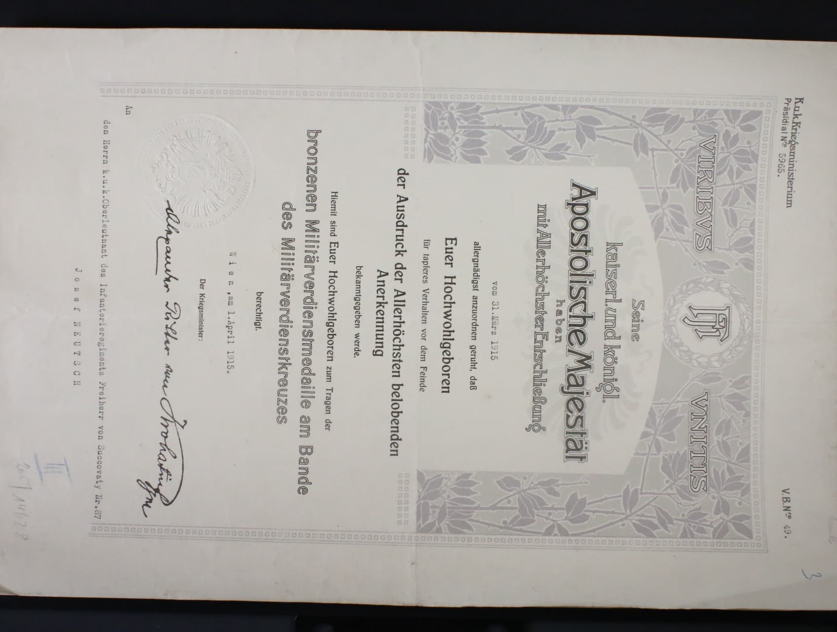 Dekret na Bronzovou vojenskou záslužnou medaili Signum Laudis F.J.I., udělen 31. března 1915